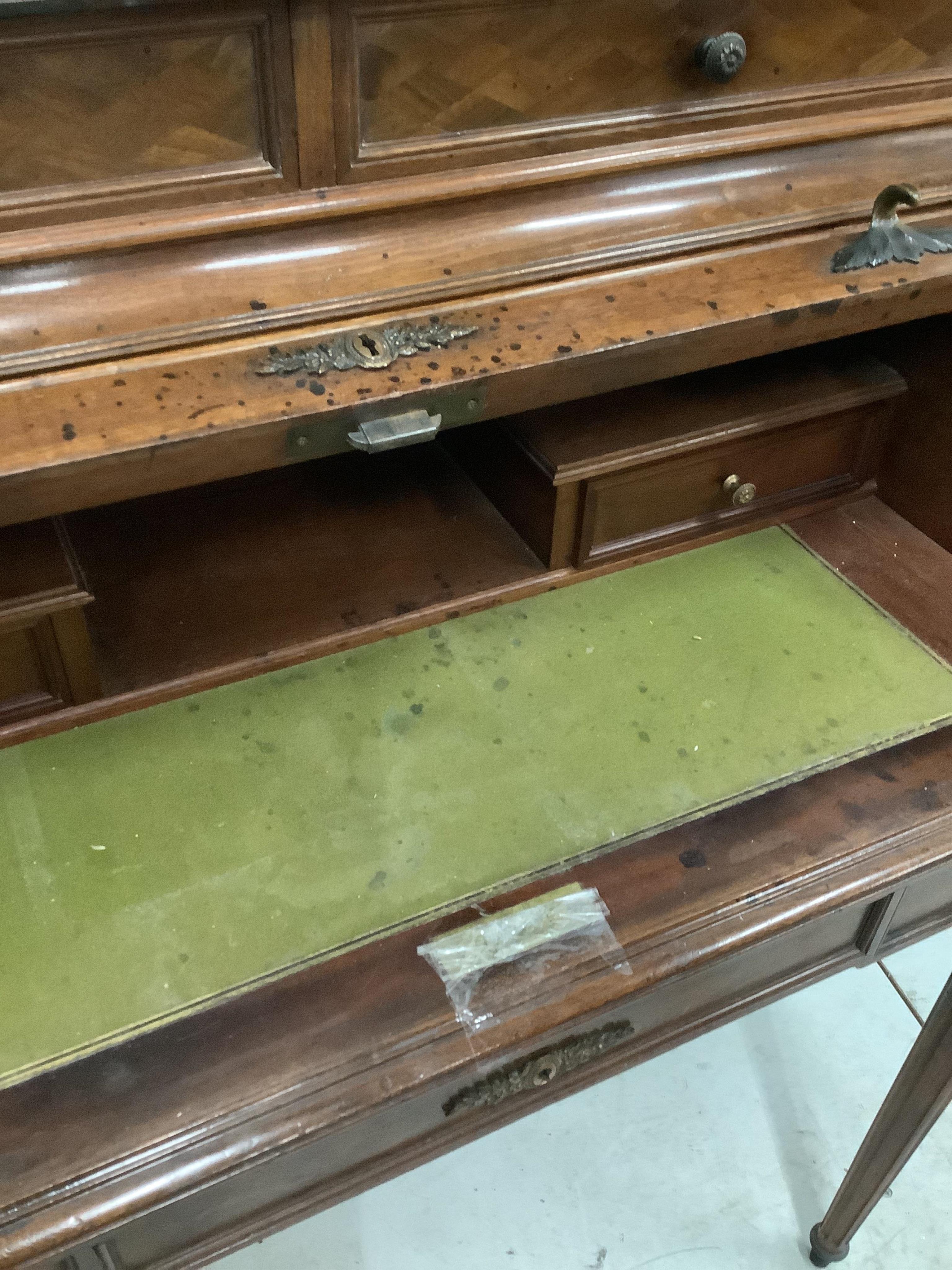 A late 19th / early 20th century French parquetry inlaid, gilt metal mounted, rouge marble topped mahogany cylinder bureau, width 79cm, depth 50cm, height 107cm. Condition - good but lacking key